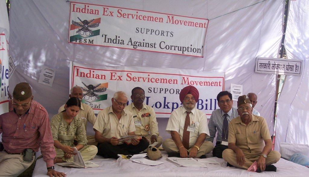 anna hazares movement against corruption Anna hazare (c)and rajkumar hirani looks on as aamir khan speaks to the crowd gathered to support anna hazare's movement against corruption at ramlila ground on august 27, 2011. anna hazares movement against corruption Anna hazare (c)and rajkumar hirani looks on as aamir khan speaks to the crowd gathered to support anna hazare's movement against corruption at ramlila ground on august 27, 2011.