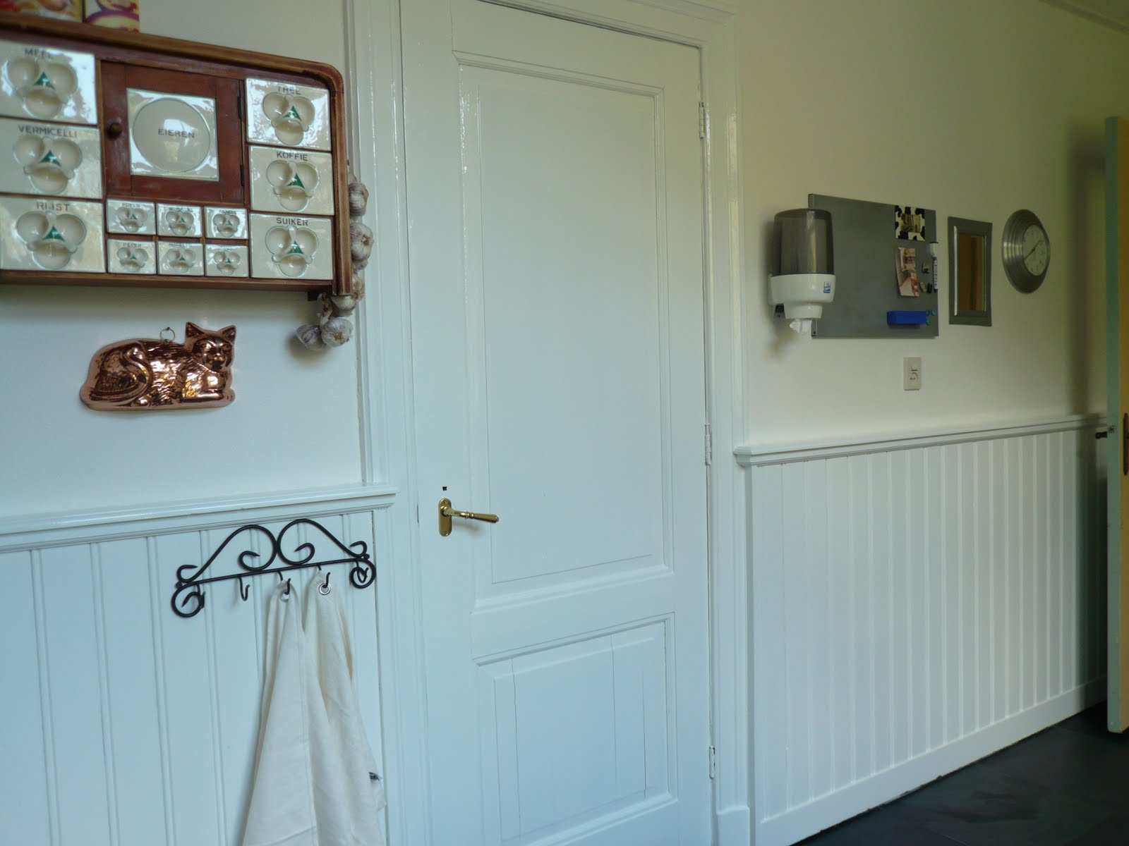 Wainscoting kitchen cabinets Painted Paneling Before and After