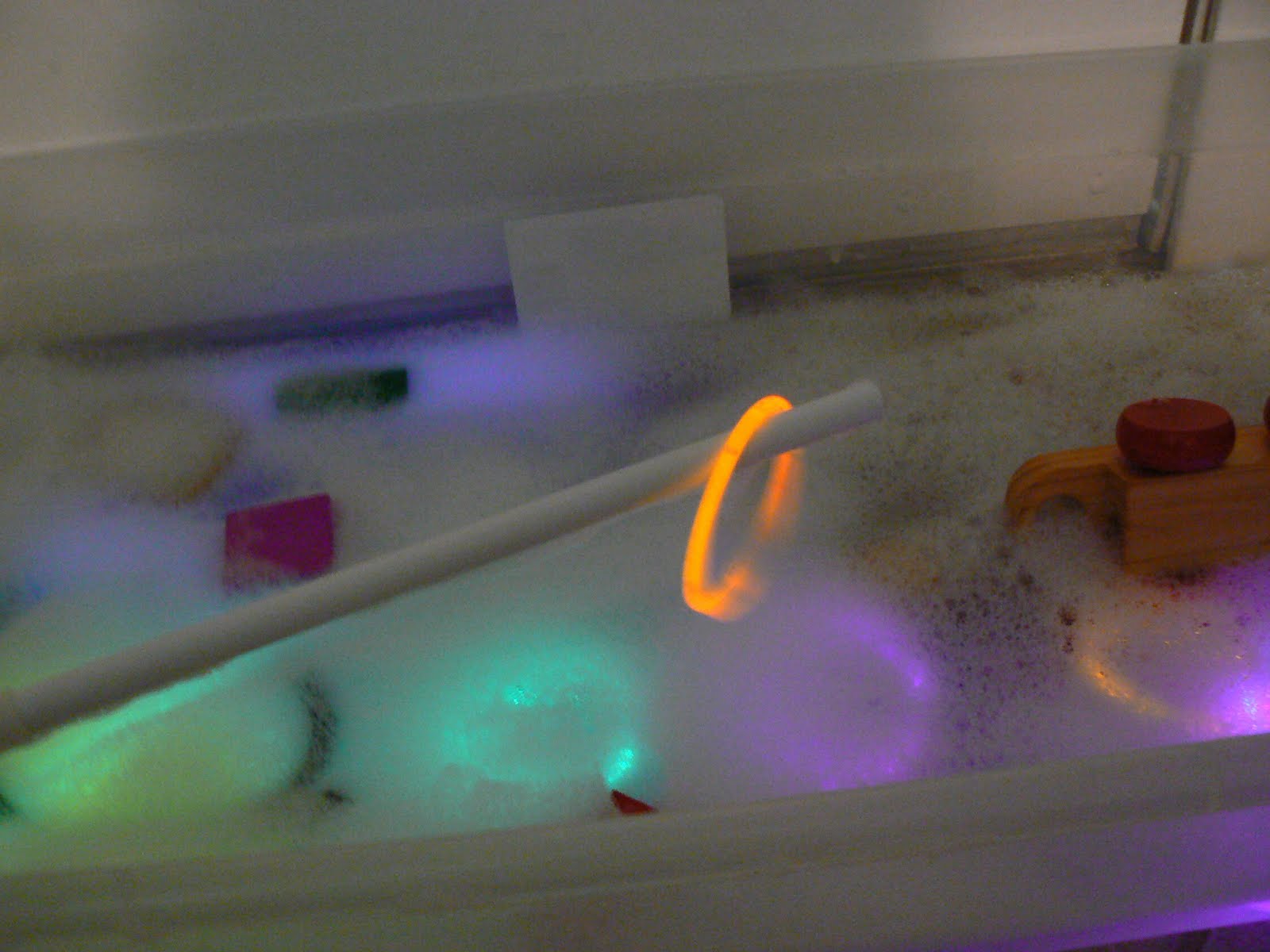 Having Fun at Home Glow in the Dark Sensory Tub Game