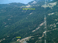Les masies de Sant Miquel de les Canals i Corrúbies des de la pujada de les Basses Canemeres Les masies de Sant Miquel de les Canals i Corrúbies des de la pujada de les Basses Canemeres