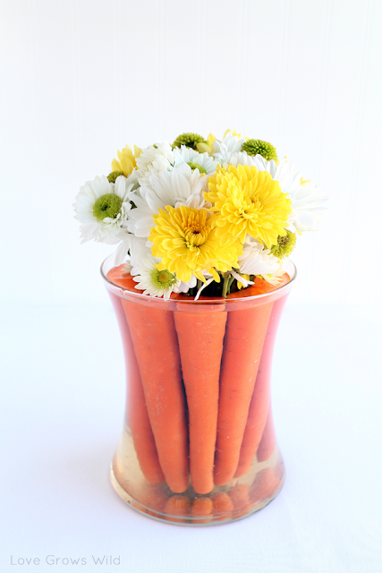 Spring-Inspired Easter Tablescape and Flower Centerpiece with Carrots www.lovegrowswild.com #spring #easter #decor