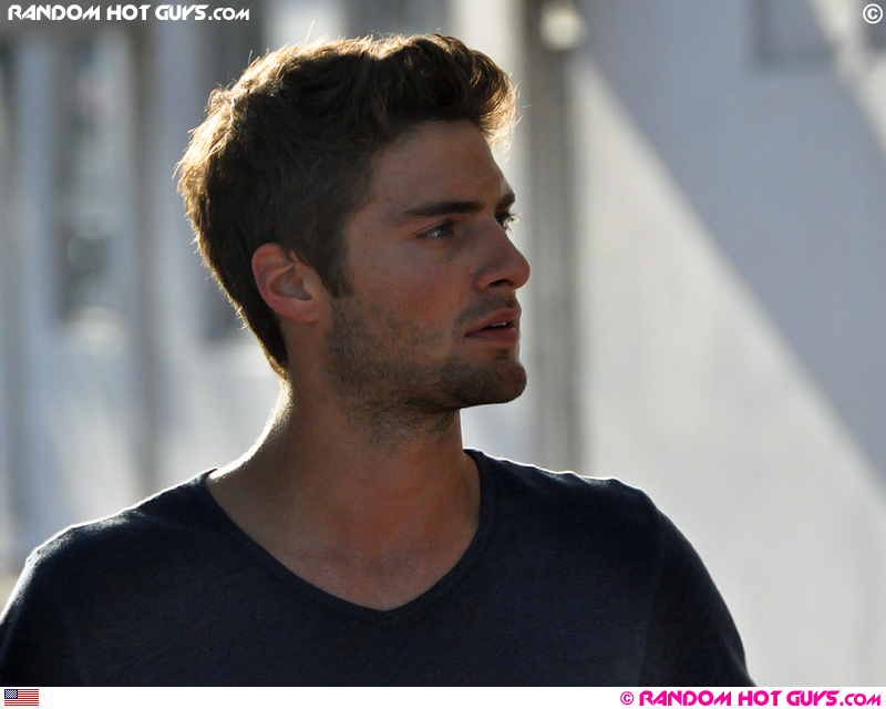 Handsome guy standing on Ocean Drive, Miami