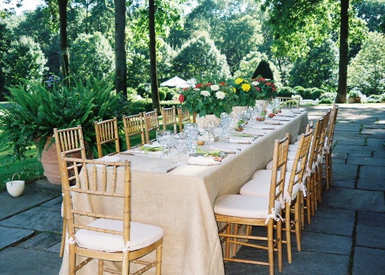 A table set for a terrace dinner party at the home of designer Janet Simon