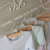 Baby Clothes on a Towel Bar / Babykleertjes aan een handdoekrek