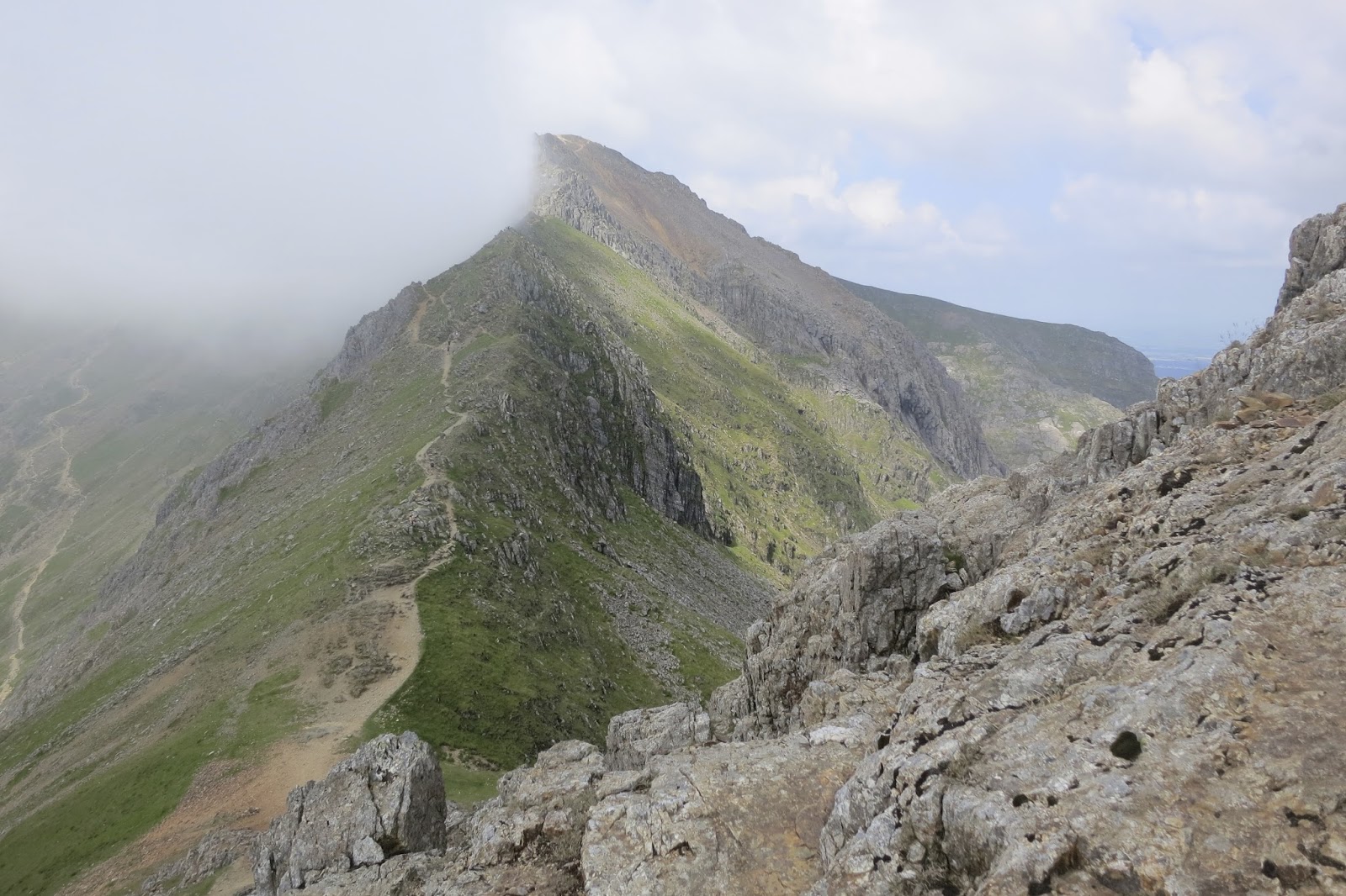 Mount Snowdon Walk via Crib Goch Ridge Route, Snowdonia. The tallest mountain in Wales. The