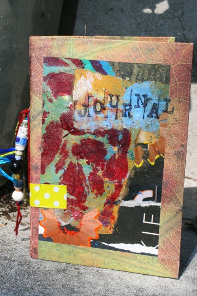 Art Journal of recycled cereal boxes, paper bags and fun. Cover detail.