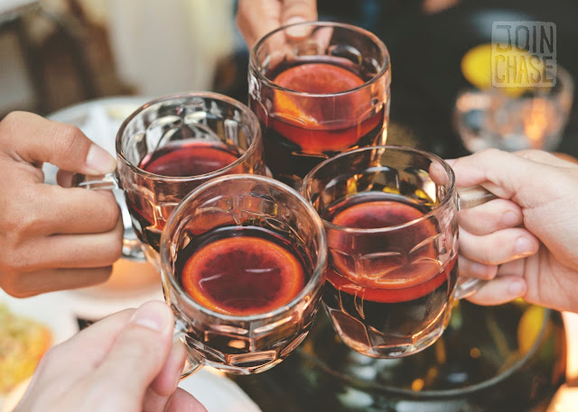 Cheers with four glasses of mulled wine in Yangon, Myanmar. 