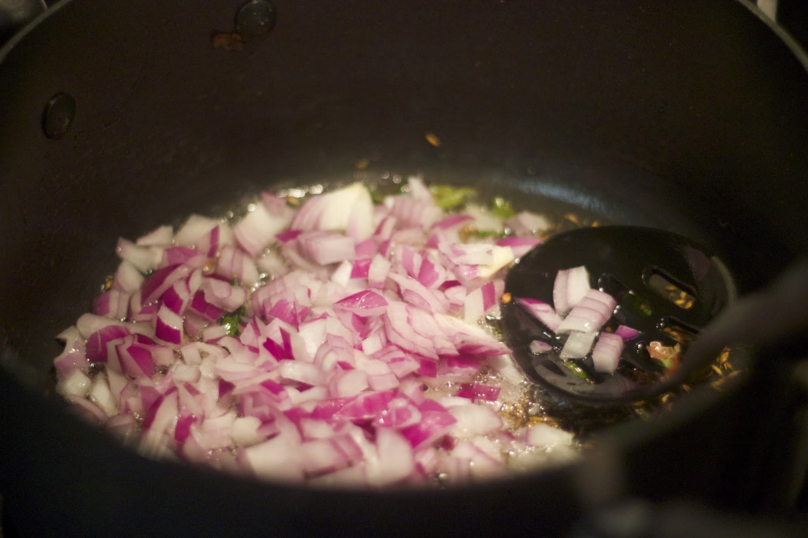 Saute onions for Vegetarian Vegan Batata / Potato Poha Indian Breakfast