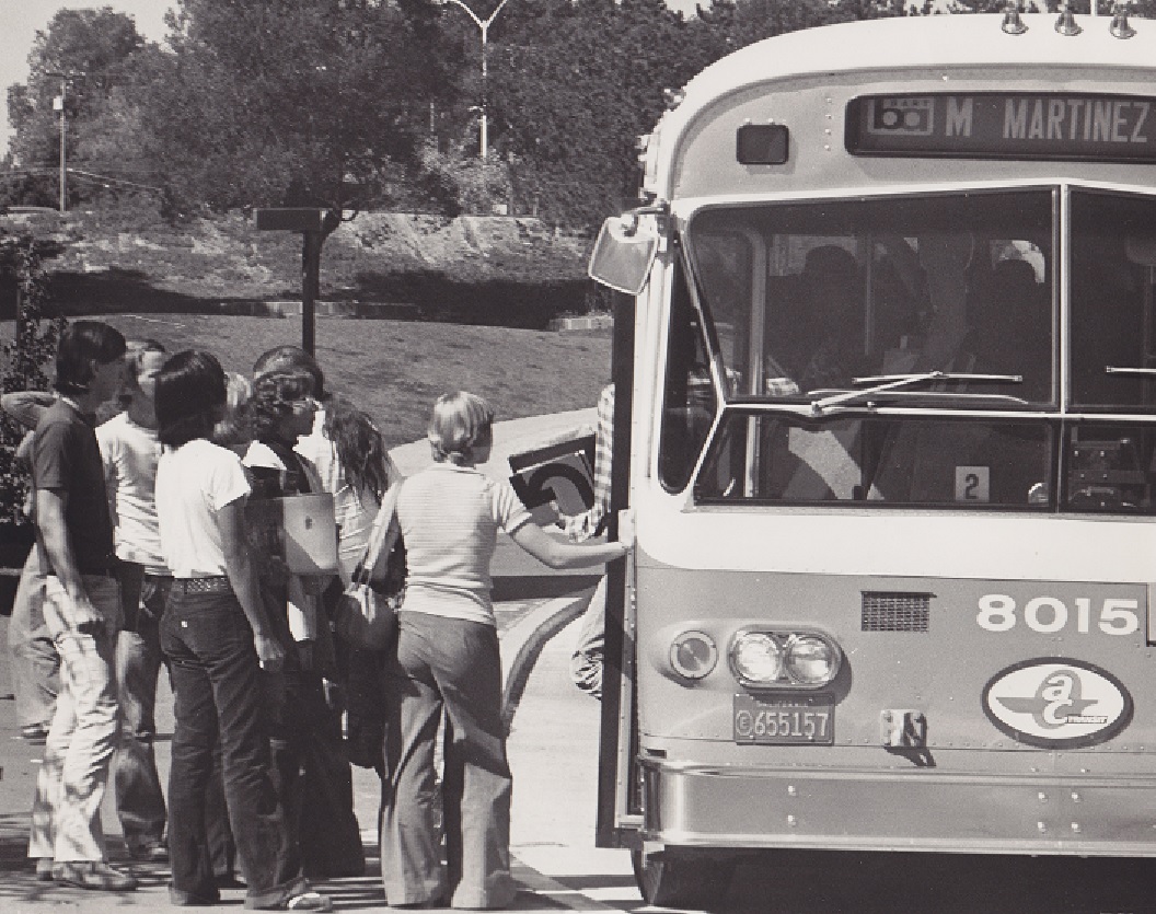 Getting on the bus, 1970s ~
