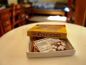 Modern dolls' house miniature backgammon set.