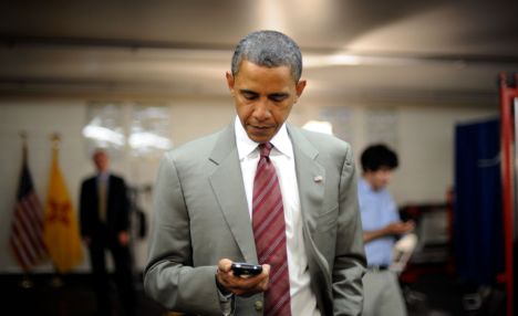 President Obama using his old BlackBerry, during a campaign
visit to Albuquerque, New Mexico in August 2008