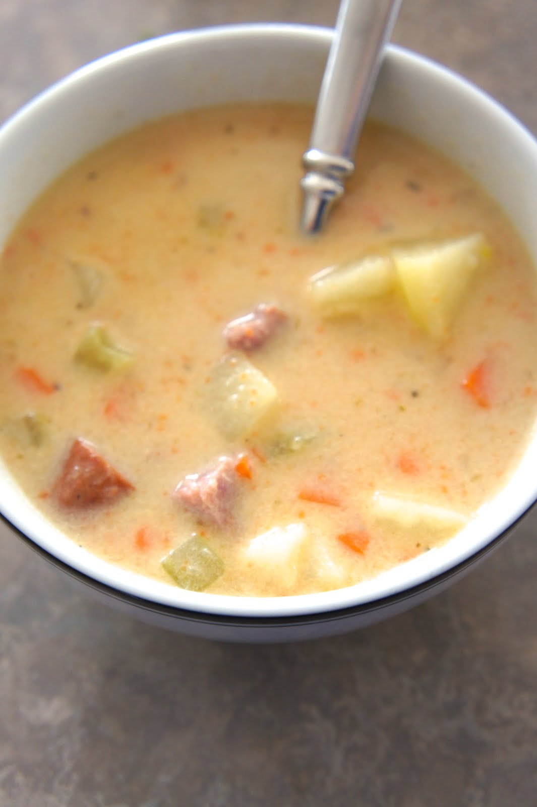 Savory Sweet and Satisfying Potato White Cheddar Sausage Soup