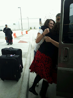 James dragging Sarah back into the car