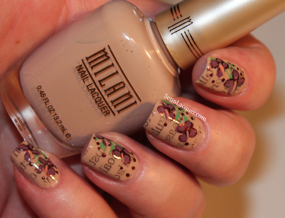 Newsprint nail art with floral accents using Milani Newsprint nail art with floral accents using Milani