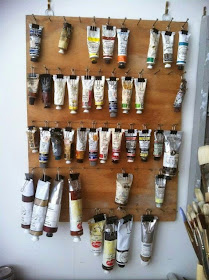 Artist's paint tubes organized with binder clips :: OrganizingMadeFun.com