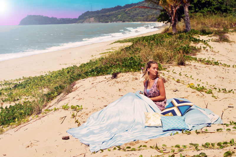 girl in boho beach bed set up on tropical far north queensland secret spot watching sunrise girl in boho beach bed set up on tropical far north queensland secret spot watching sunrise