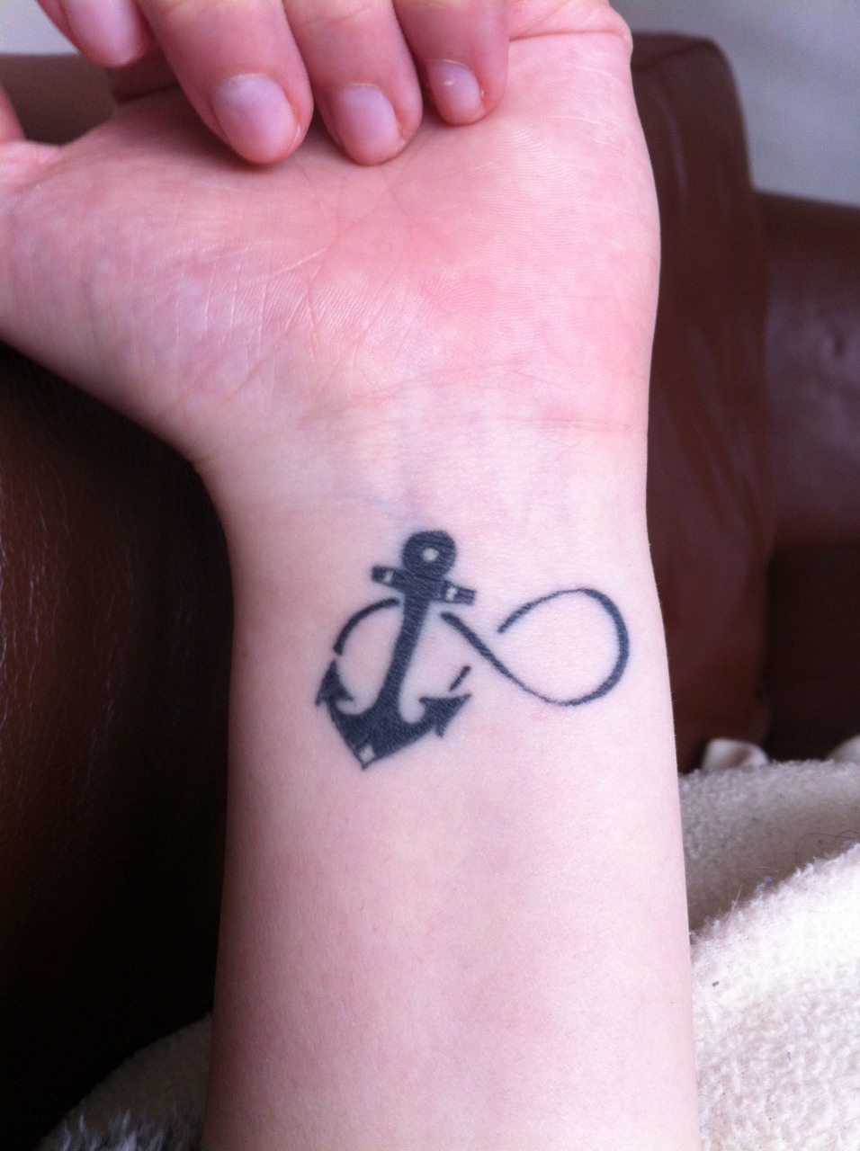Infinity anchor tattoo meaning