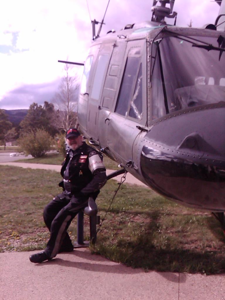 Seeing the Huey helicopter nose down in it's pose as a memorial, he broke. Seeing the Huey helicopter nose down in it's pose as a memorial, he broke.