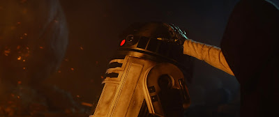 Still of R2D2 and Luke Skywalker from Star Wars Episode VII: The Force Awakens