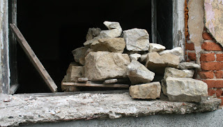 Stacking rocks from the interior wall Stacking rocks from the interior wall