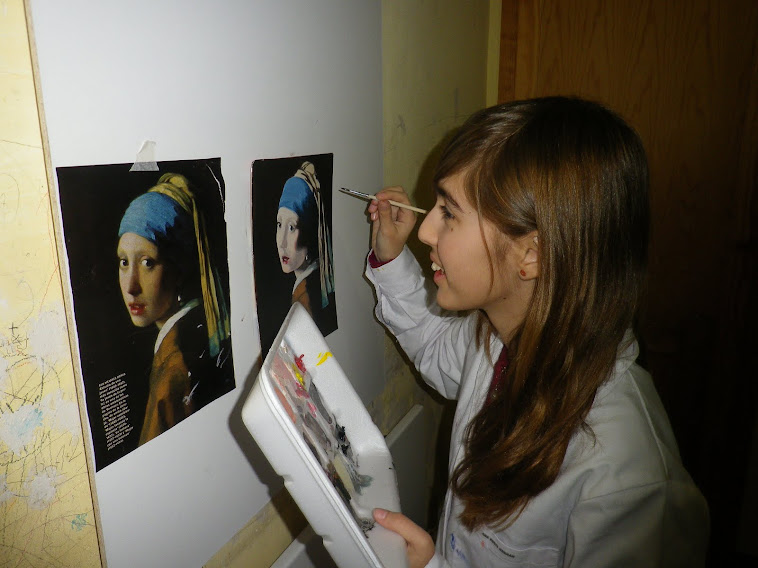Haciendo una copia de La joven de la perla de Vermeer.