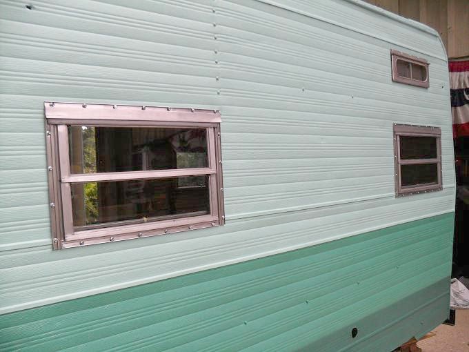 town and prairie Installing Windows in a Vintage Camper
