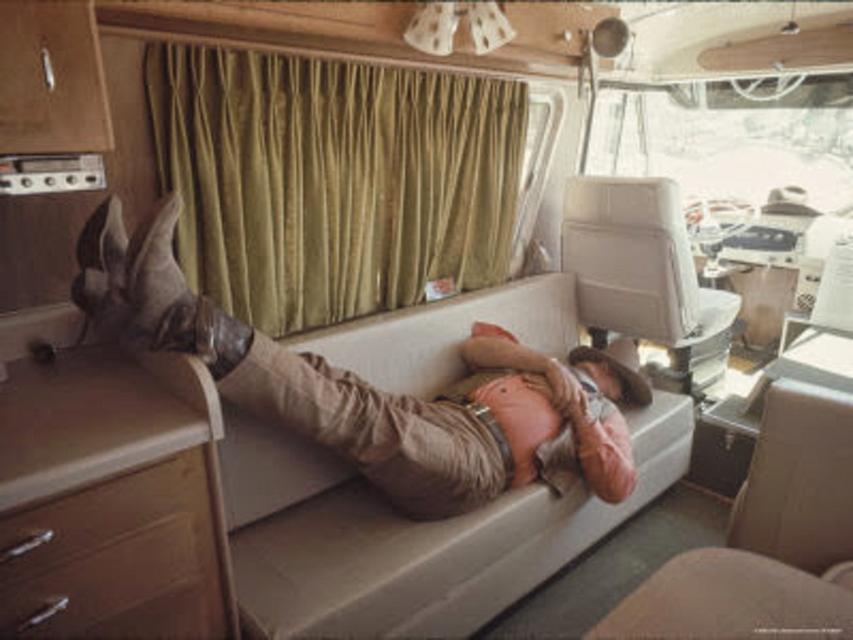 Wayne in his motorhome, (home away from home), taking a break while filming "The Undefeated".