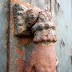 a hand doorbell with some years