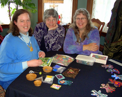 Pre-opening demonstration of bead embroidery process by Robin Atkins, with Becki Applegate and Christy Hinkle