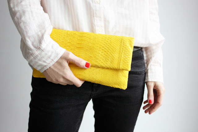 python leather clutch