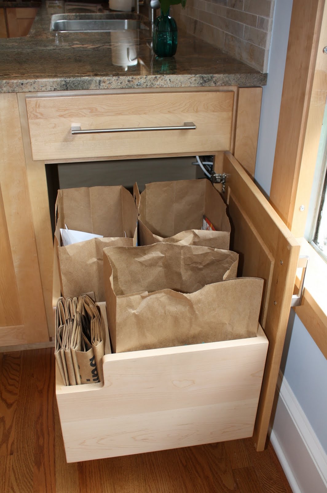 Hidden hinges for kitchen cabinets our recycling is hidden on the breakfast room side of the peninsula