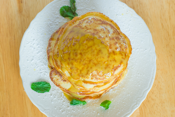 Lemon Pancakes with Mint Custard Sauce | thumb in plum Lemon Pancakes with Mint Custard Sauce | thumb in plum