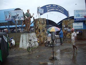 Statue of St Peter at the entrance of Negombo fish market.