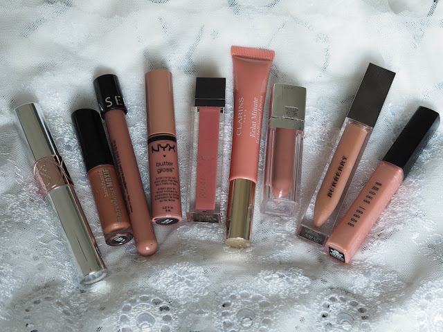 YSL Volupte Tint-in Oil in 4 I Rose You, bareMinerals Marvellous Moxie Lip gloss in Spark Plug, Sephora Oil Infusion in 9 Iced Coffee, NYX Butter Gloss in Tiramisu, Jouer Lip Gloss in Mirage, Clarins Instant Light Lip Perfector in 05, Maybelline Colour Elixir in 725 Caramel Infused, Burberry Lip Glow in 09 Nude Beige, Bobbi Brown Pink Seashell Lip Gloss