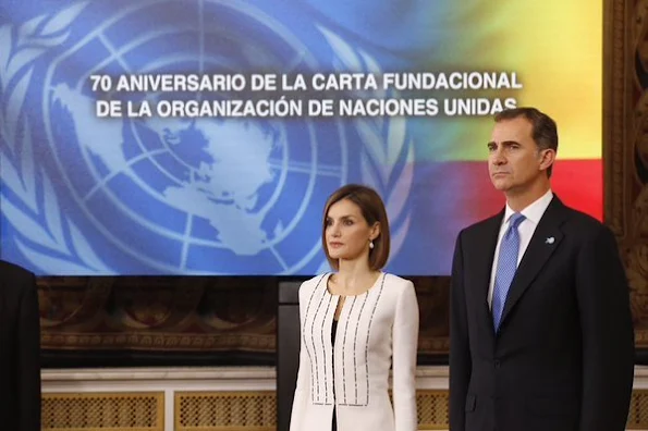 Secretary-General of the United Nations Ban Ki-moon, his wife Yoo Soon-taek Spain's King Felipe VI and Spain's Queen Letizia listen to the Spanish national anthem at the Royal Palace