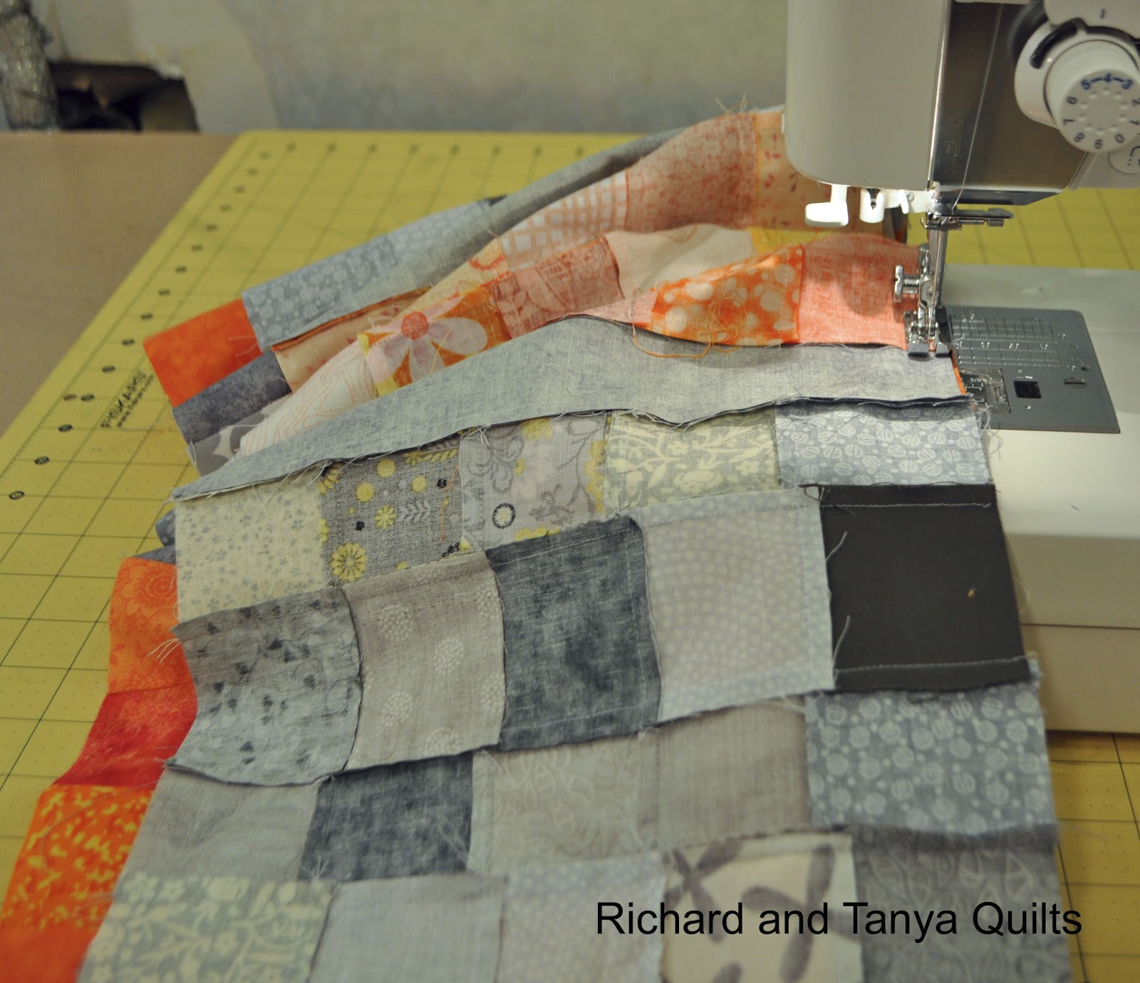 Richard and Tanya Quilts Orange and The gray are here at last.
