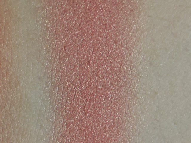 Swatch of Makeup Geek blush in Romance