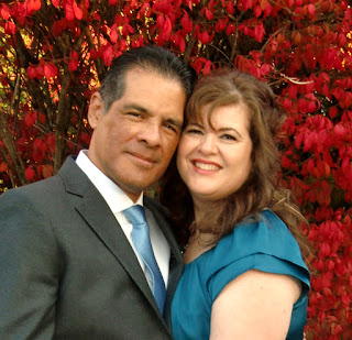 Fall red leaves frame Carlos and Mona-Rae at The Salish Lodge Mona-Rae and Carlos are framed by brilliant red leaves at The Salish Lodge & Spa