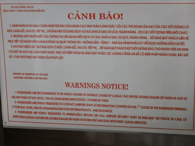 Tourists are reminded to book taxis from hotels, tour agencies and airport staff to prevent from being swindled by illegal taxi drivers in Hanoi, Vietnam Tourists are reminded to book taxis from hotels, tour agencies and airport staff to prevent from being swindled by illegal taxi drivers in Hanoi, Vietnam