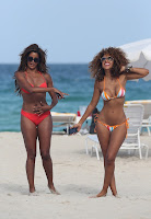 Claudia Jordan and friend looking hot in bikinis at the beach