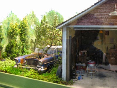 miniature garage and old car
