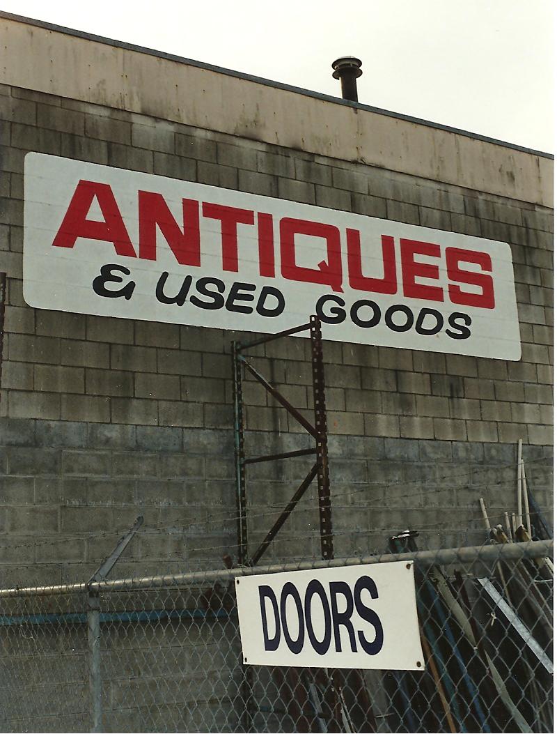 The World of JEK Antique Store Sign