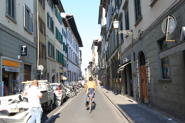 Most of the lanes are narrow thus the locals prefer to drive small vehicles or ride on bicycles in Florence, Italy Most of the lanes are narrow thus the locals prefer to drive small vehicles or ride on bicycles in Florence, Italy