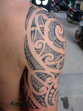 Maori half sleeve tattoo