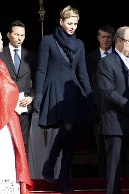 Prince Albert II of Monaco  and Princess Charlene leave the Monaco Cathedral after the Sainte Devote festivities in Monaco