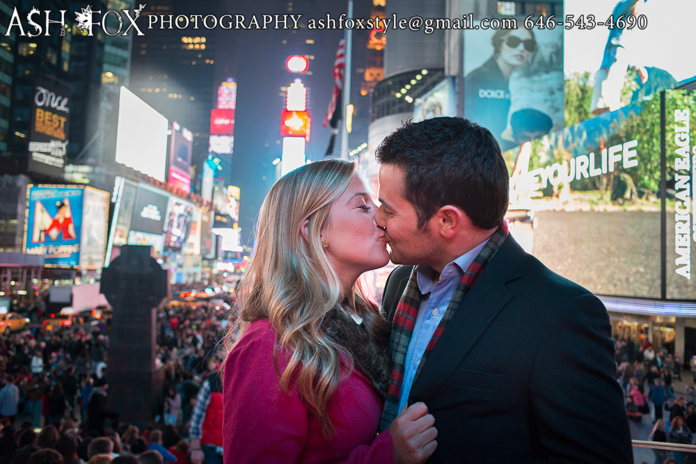Times Square couple kissing after marriage proposal