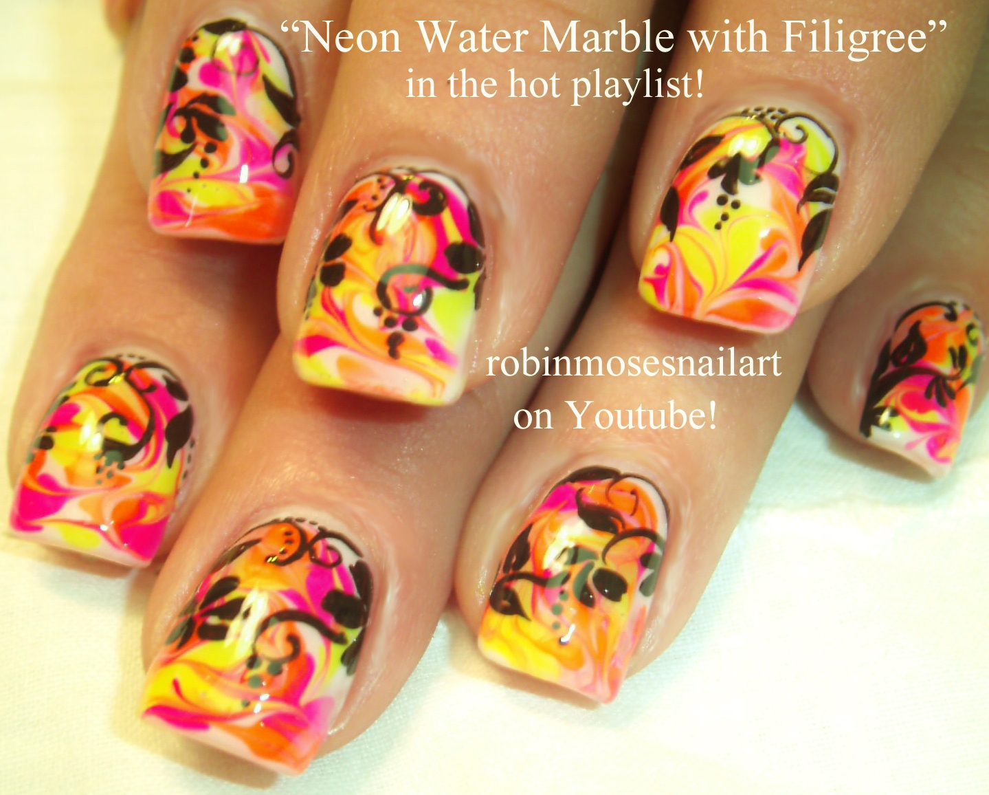 3. How to Create a Rainbow Flower Nail Design - wide 1