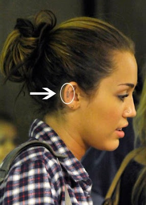 Miley Cyrus tattoo ear