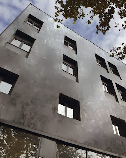 Фасадная поверхность с облицовкой широкоформатными плитами Ламинам керлит вентилируемый фасад