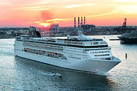 Cruise ship with sunset in background